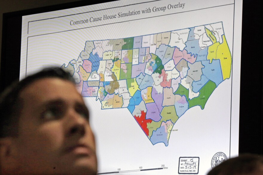 In this Monday, July 15, 2019 file photo, a state districts map is shown as a three-judge panel of the Wake County Superior Court presides over the trial of Common Cause, et al. v. Lewis, et al, in Raleigh, N.C. Fresh off sweeping electoral victories a decade ago, governors and lawmakers in several states used new census data to redraw voting districts for Congress and state legislatures that were intended to help their party remain in power for years to come. Those efforts largely paid off, particularly for Republicans. An Associated Press analysis designed to detect the effects of gerrymandering shows that Republicans enjoyed a greater political advantage in more states over the past decade than either party had over the past 50 years.