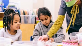 Two children at a Right Steps Child Development Center in Lafayette play with arts and crafts. Since the start of the pandemic, Right Steps facilities have struggled to bounce back to pre-pandemic enrollment levels.