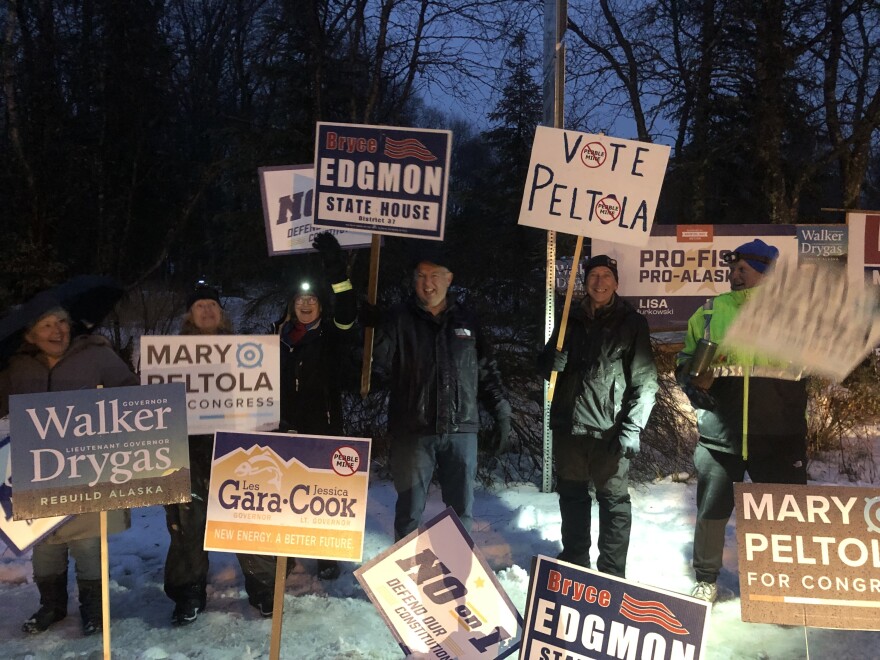 DeeDee Bennis, Dennis Lisac, Rep. Bryce Edgmon, Mark Lisac and Ted Kried wave signs on the corner of Aleknagik Lake Road and Kanakanak Road on Election Day. Nov. 8, 2022.