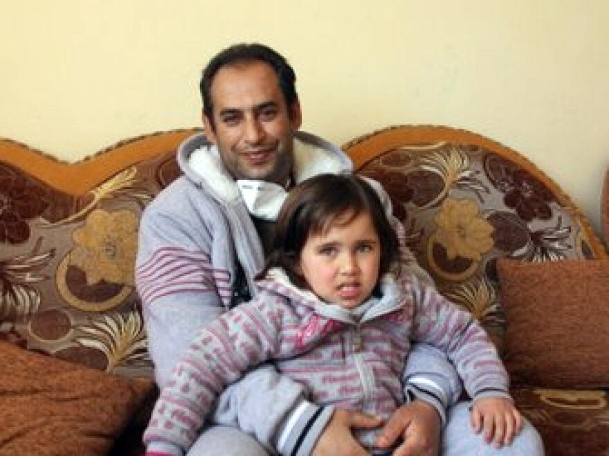 Dr. Hamad Suleiman Daher, shown here with his youngest daughter, was the first person to receive a kidney transplant in Gaza.