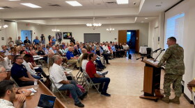 Col. James Booth of the Army Corps of Engineers addresses a standing-room-only crowd at Indian Shores Town Hall