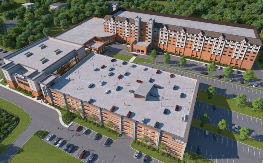 A rendering of the proposal for a two-phase 93,000-square-foot casino and restaurant at the Sheraton Nashua. The first phase of the project is the portion in front, including the five-story parking garage, with the existing building to the rear. The first phase is before the Planning Board June 4. (Courtesy Montgomery Roth Architects)