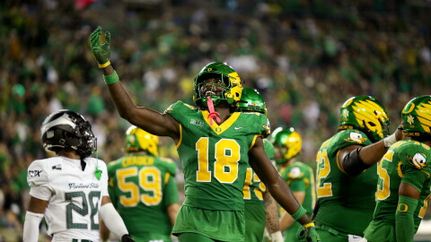 Oregon tight end Kendre Harrison (18) celebrates a touchdown during the first half of an NCAA college football game against Portland State, Friday, Sept. 18, 2026, in Eugene, Ore. 