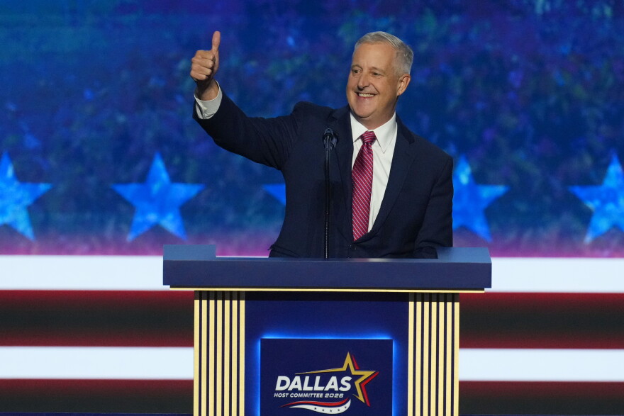 Michael Whatley, North Carolina senatorial candidate, greets delegates as he takes the stage at the Republican convention in Dallas, Wednesday, Sept. 9, 2026. 