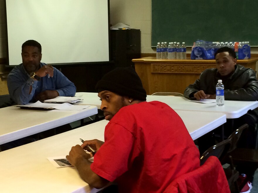 Clockwise from left: Robert Crawley, Donell Dismukes and Keith Chambers learn about resume writing during a training session organized by Ferguson 1000 Jobs on Saturday, February 14, 2015.