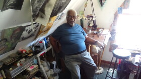 Artist William Nolen in his attic gallery in the Brewers Hill neighborhood.