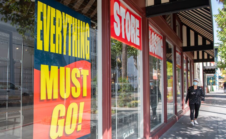 Store closing signs are posted at a Sur La Table kitchenware store on Sept. 22 in Los Angeles. Thousands of retail stores across the country have closed during the pandemic.