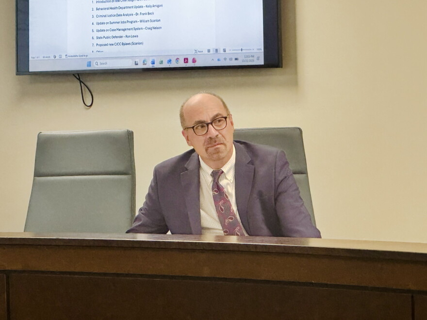 Judge Mark Fellheimer sitting behind a table.