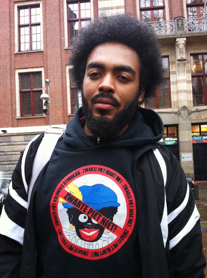 Raimund Larat at a recent Sinterklaas parade in Amsterdam. He and his family object to the Black Pete tradition and believe the Christmas character should change.