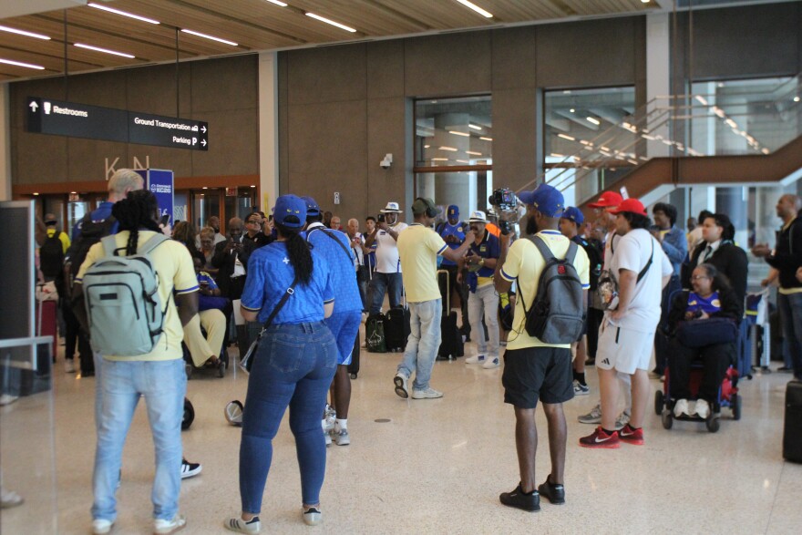 Curaçao fans gathered to dance and party after arriving in Kansas City Friday afternoon.
