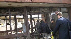 APR Reporter Kristen Taylor took this photo of fellow journalists and other officials entering a damaged part of Enterprise High School on March 2, 2007.