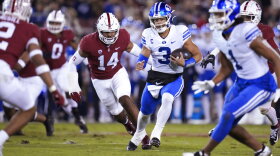 BYU quarterback Jaren Hall (3) runs for a 19-yard touchdown against Stanford during the first half of an NCAA college football game in Stanford, Calif., Saturday, Nov. 26, 2022. (AP Photo/Godofredo A. Vásquez)
