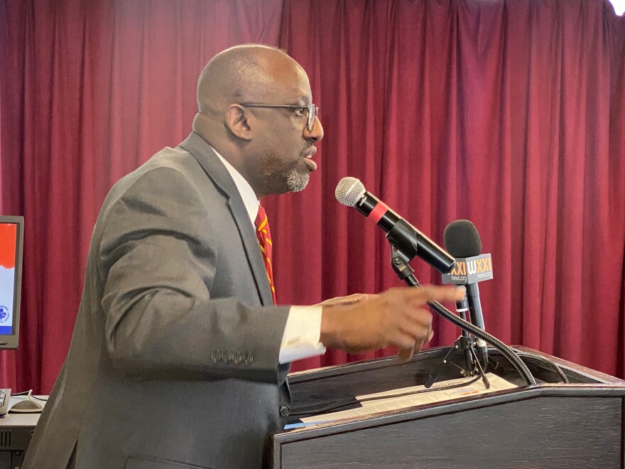 Marlowe Washington, St. John Fisher's Senior Diversity Officer, speaks at Each One Reach One symposium