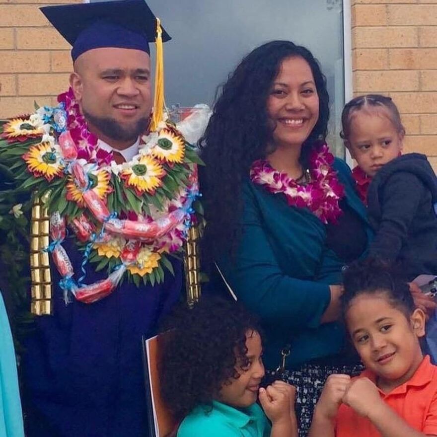 A photo of Ray Tuineau at his graduation with his family.