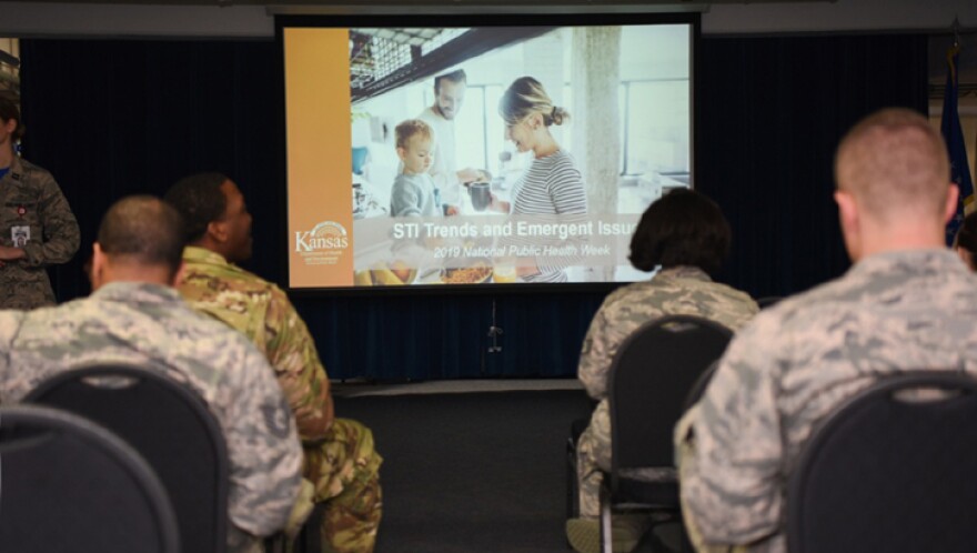 Service members attend a briefing on STIs at McConnell Air Force Base, Kansas.