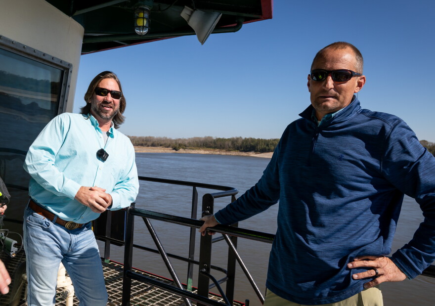 Captain Adrian Perani, left, with Matt Young, chief of navigation of the Memphis District U.S. Army Corps of Engineers aboard the Dredge Hurley.