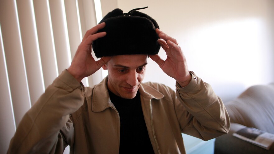 Izidor Ruckel dons a hat of a style common in his birthplace, Romania. He now lives in Denver.