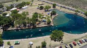 The San Solomon Springs feed the pool at Balmorhea State Park, pictured here in an aerial view, and are vital for local farmers and endangered desert fish. But flows from the springs have declined in recent decades.