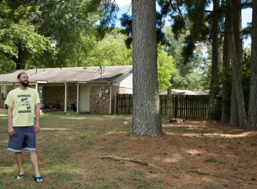 Jason Haley stands in his backyard in Southaven, Mississippi, on Aug. 14, 2026.