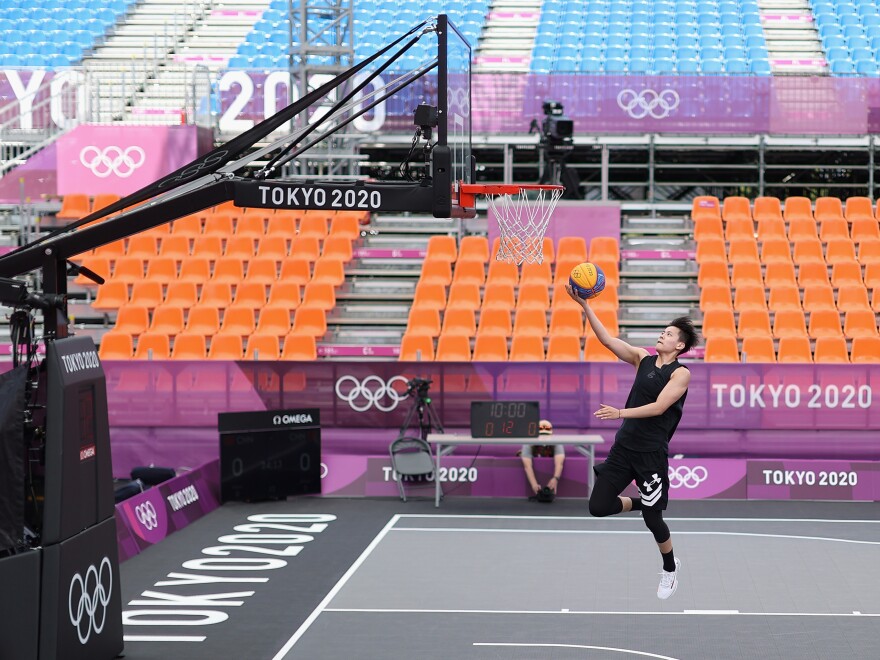Many Olympic athletes at the Tokyo Summer Games are having to get used to empty stands, the occasional coronavirus quarantine and loneliness. Zhiting Zhang of Team China practices in 3x3 basketball at deserted Aomi Urban Sports Park.