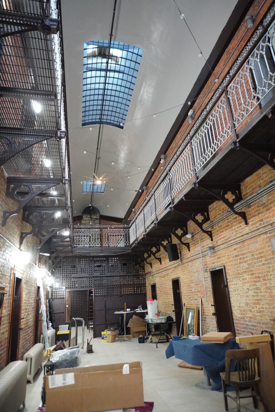 The interior of the "Cell Block" on February 25, 2026, during renovations. There are two floors lined with prisoner cells. 