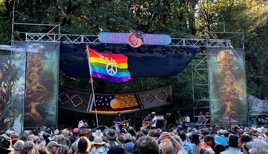 A band plays a tribute to Grateful Dead lyricist Robert Hunter on the main stage during the 53rd annual Oregon Country Fair.