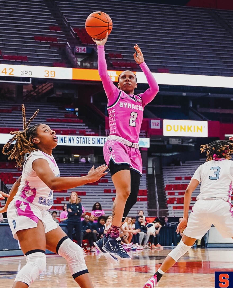 Dyaisha Fair (pink #2) rises up for a floater during her 23-point performance against North Carolina. 