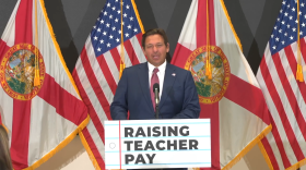 Governor Ron DeSantis talks about teacher pay at a press conference in Miami on Monday, June 10.