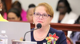 Pictured: Department of Health Commissioner, Justa Encarnacion