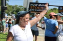 Bonnie Zampino waves to onlookers at a rally in Orleans to support former and current residents of the Community of Jesus. Zampino, who says she lived at the religious commune as a teen, tells CAI and the Provincetown Independent she was sexually abused by the group's doctor.