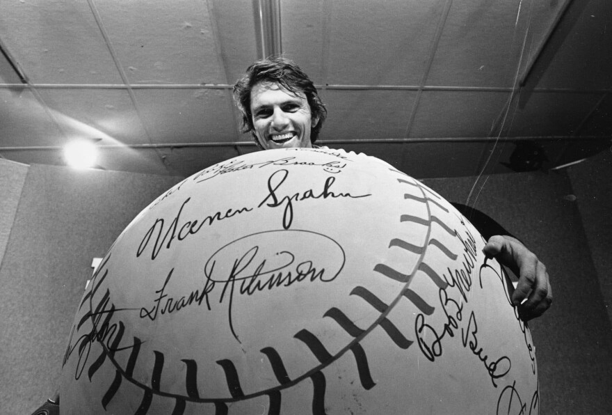 Boston Red Sox southpaw Bill Lee holds a large baseball before the start of fifth World Series game against the Cincinnati Reds at Riverfront Stadium in Cincinnati, Ohio, Thursday, Oct. 16, 1975. (AP)