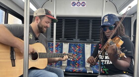 Musicians Nick Rose and Preston Charles the Third entertained commuters on TANK buses for a day.
