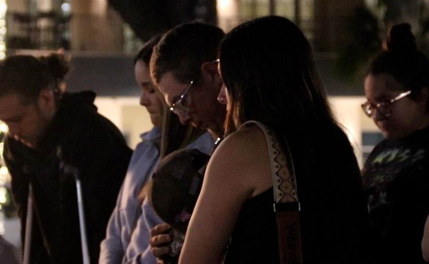 Community members attend a vigil in honor of Paisley Brown.