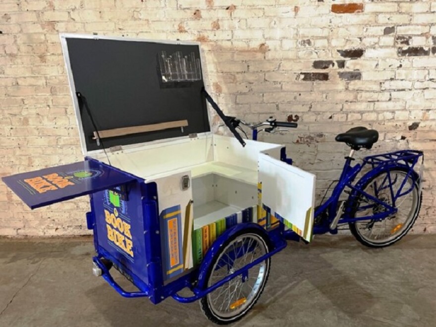 Box of books on bicycle