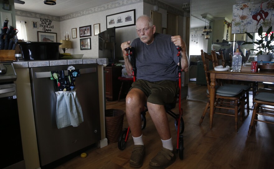 George Hitchens, who spent most of his career in construction and steel factories in Pennsylvania, is now battling bone marrow cancer and facing financial strain. He and his wife, both on Social Security, say the cost of living has become increasingly difficult. When they first moved in, their lot rent was about $370 a month—now, Hitchens says, it has nearly doubled. "We can make do on what we have," he says.