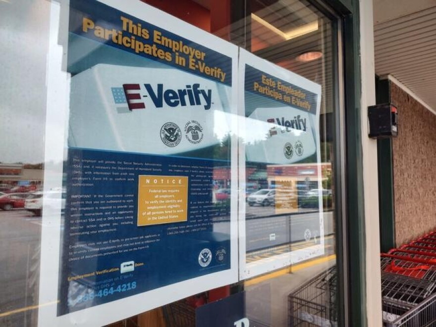 Employers enrolled in E-Verify are required to post information about the tool in an obvious place. These posters are displayed at the front entrance to the Keene Hannaford location. (Keene Sentinel photo)