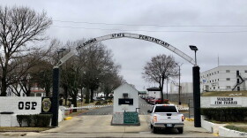 The front gate of the Oklahoma State Penitentiary in McAlester, Okla., on Feb. 17, 2022, shortly after the execution of Gilbert Postelle was carried out there.