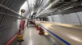 The Relativistic Heavy Ion Collider (RHIC). RHIC is located underground and has a circumference of 2.4 miles.