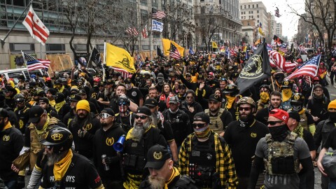 Members of the Proud Boys march toward Freedom Plaza during a protest in December 2020 in Washington, D.C. The Proud Boys has been designated as a hate group by the Southern Poverty Law Center.