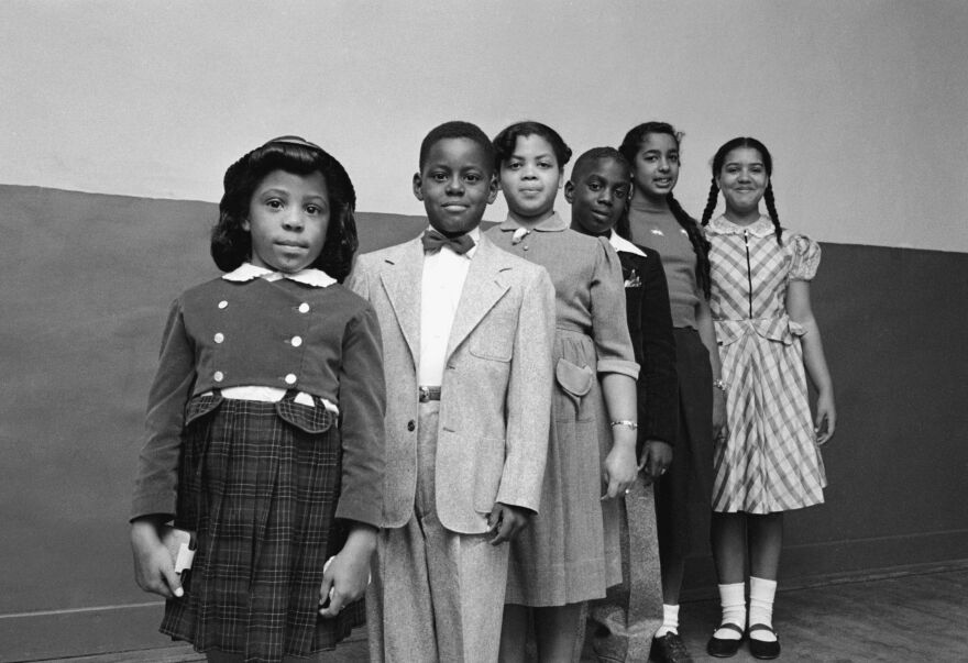 Linda Brown (center) with other children who were litigants in the landmark Brown v. Board of Education Supreme Court case.