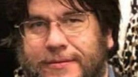 a headshot of Jon Hall