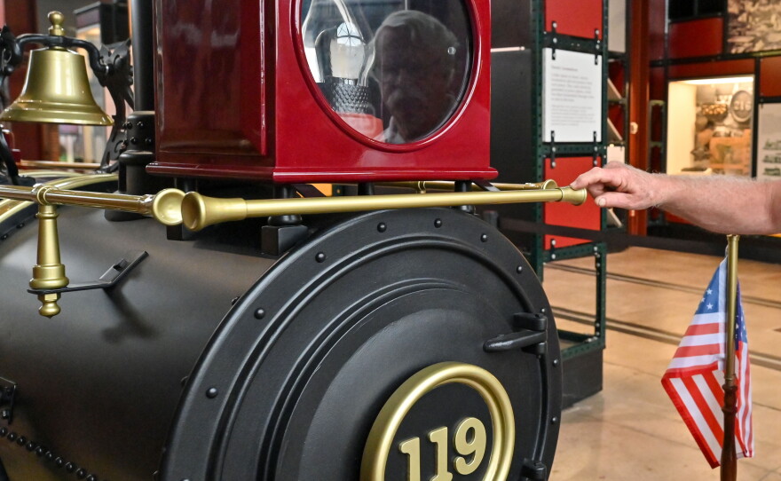 Dan Hryhorcoff is reflected in the train lantern.