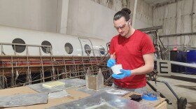 Kyle Garofolo, a Mount Pocono resident, works with fiberglass as part of Johnson College's aviation technology program.