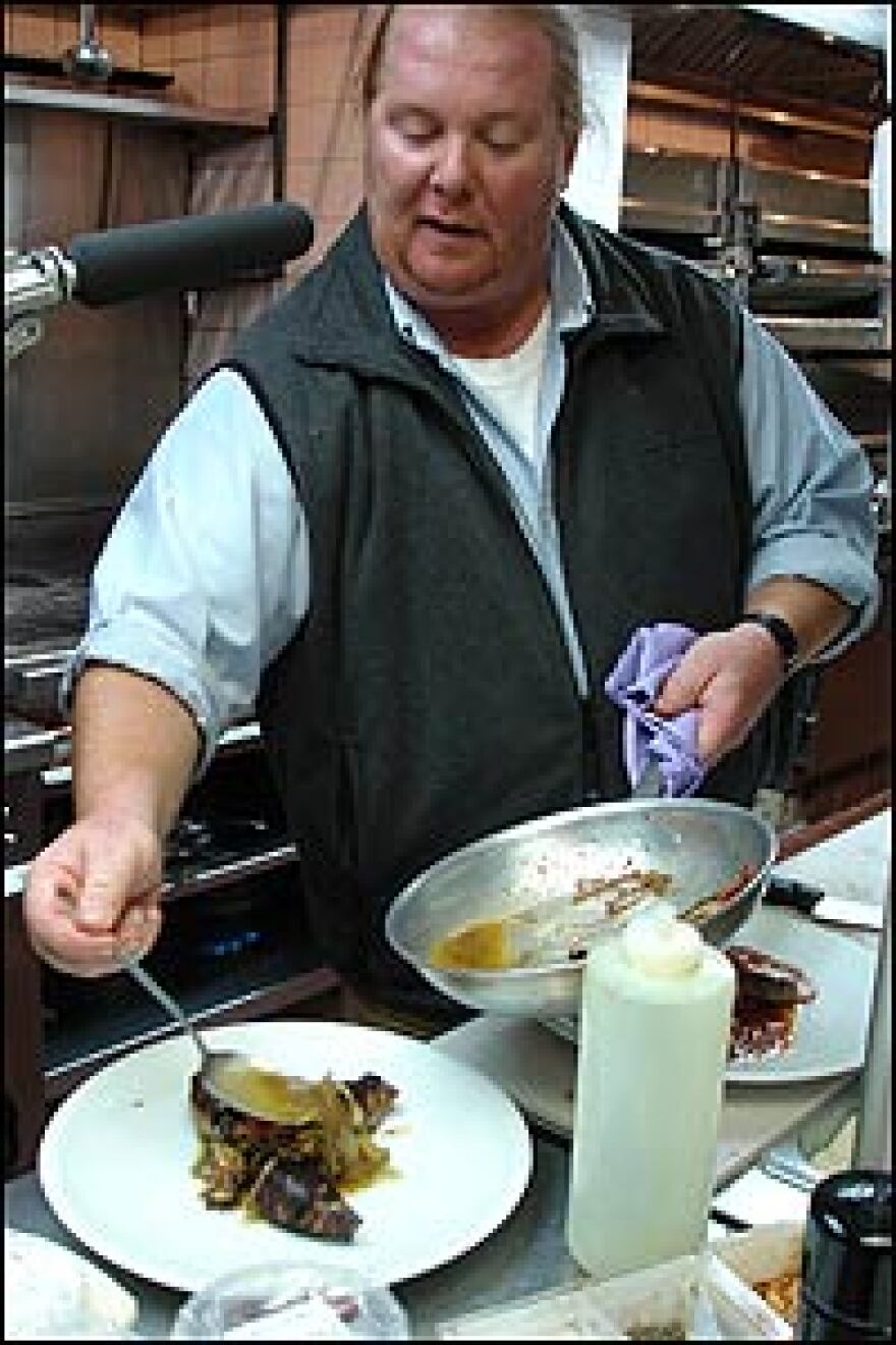 The chef at work, only mildly distracted by a radio microphone, at his New York restaurant Otto.