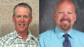 Two photos sit next to each other. The left photo is of a white middle-aged man wearing a green, yellow, black and white button down shirt. He stands against a cinderblock wall and is smiling. The photo on the right is of a bald white man with a reddish brown and greying goatee. He wears a light blue button down shirt and a dark blue and patterned light blue paisley tie. He's smiling is poses in front of a grey and white faded background.