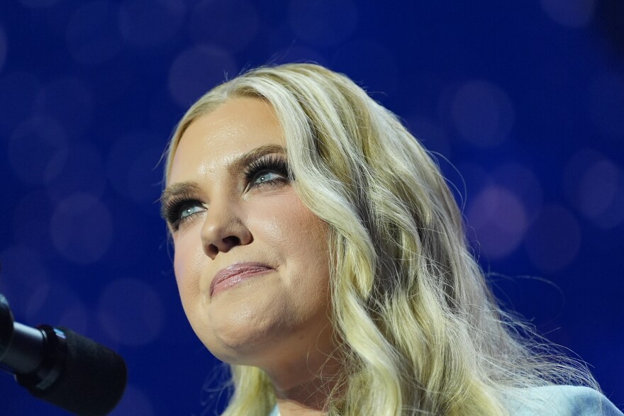 FILE - Erika Kirk speaks before President Donald Trump at a Turning Point USA event at Dream City Church, April 17, 2026, in Phoenix.