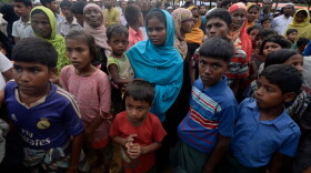 Rohingya Muslim refugees wait for relief supplies at Thaingkhali refugee camp in Ukhia on Oct. 20, 2017.
Some 582,000 Rohingya refugees have fled their homes in Myanmar and arrived in Bangladesh since late August, the United Nations said Oct. 17, warning that thousands more were stranded at the border. (Tauseef Mustafa/AFP/Getty Images)