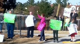 Residents gather across the street from a casino construction site in south Broken Arrow.