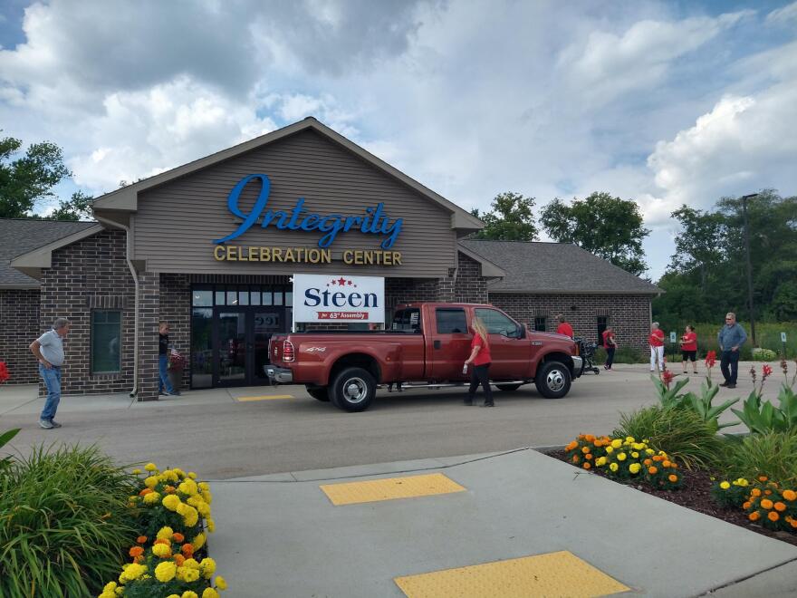 Several vehicles carrying Steen for Assembly signs were parked at Thursday's event.