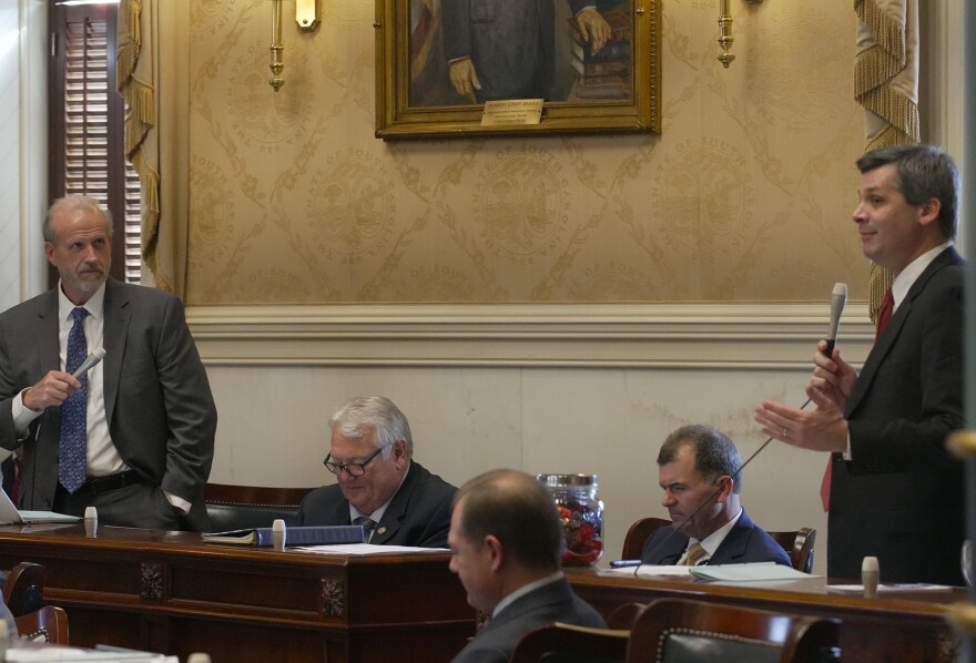 Sen. Tom Corbin, R-Greenville, and Senate Majority Leader Shane Massey, R-Edgefield, discusses the Convention of States for a balanced budget amendment bill in the Senate chamber at the South Carolina Statehouse on Jan. 14, 2026.
